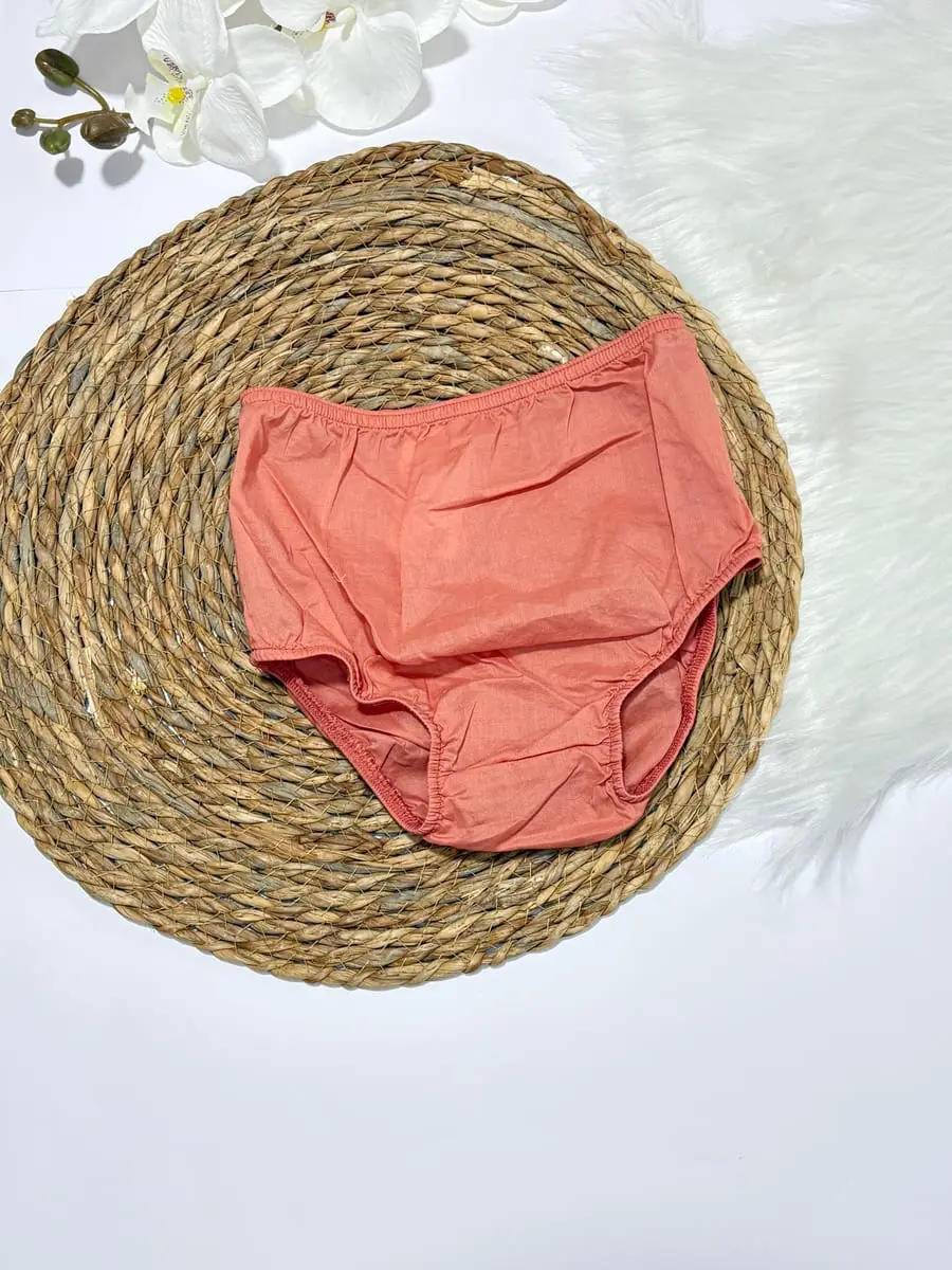 Vestido rosado arriba y abajo flores y naranja y calzoncito · talla 18 Meses