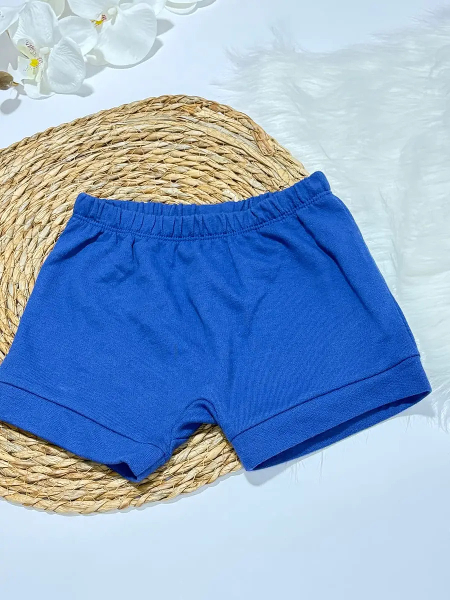 Body de caritas blanco y camiseta celeste de caritas y pantaloneta azul · talla 18 Meses