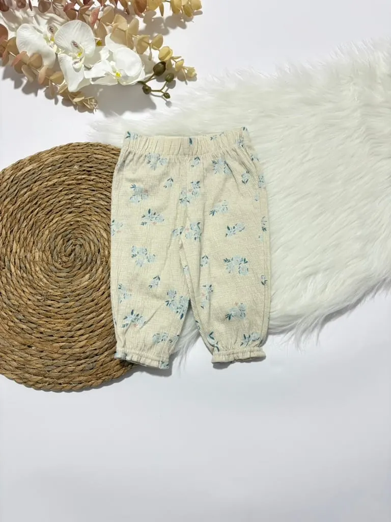 Body celeste y licra de flores celestes · talla 6 Meses