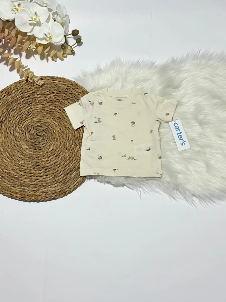 Overall de color celeste y camisa de pascua · talla 0 Meses